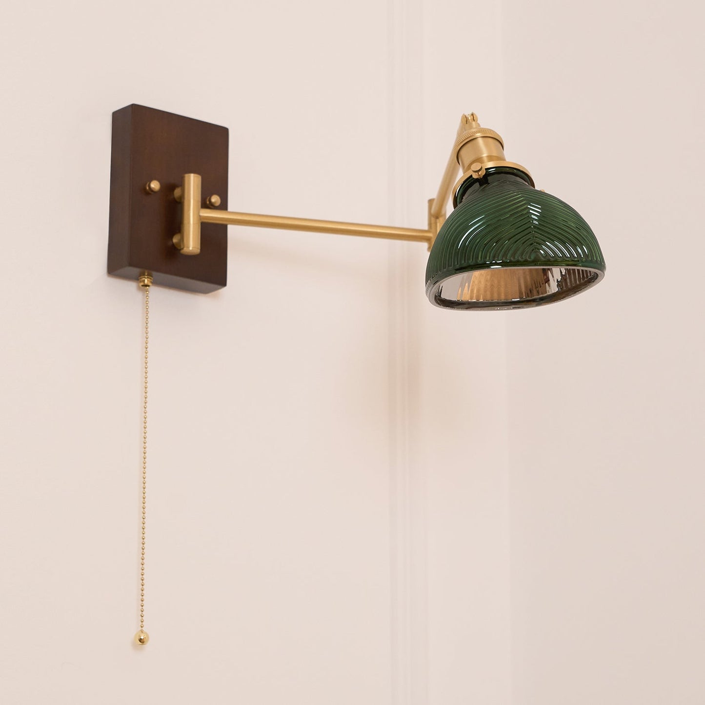 Emeric Adjustable Swing Arm Wall Lamp with Green Glass Shade