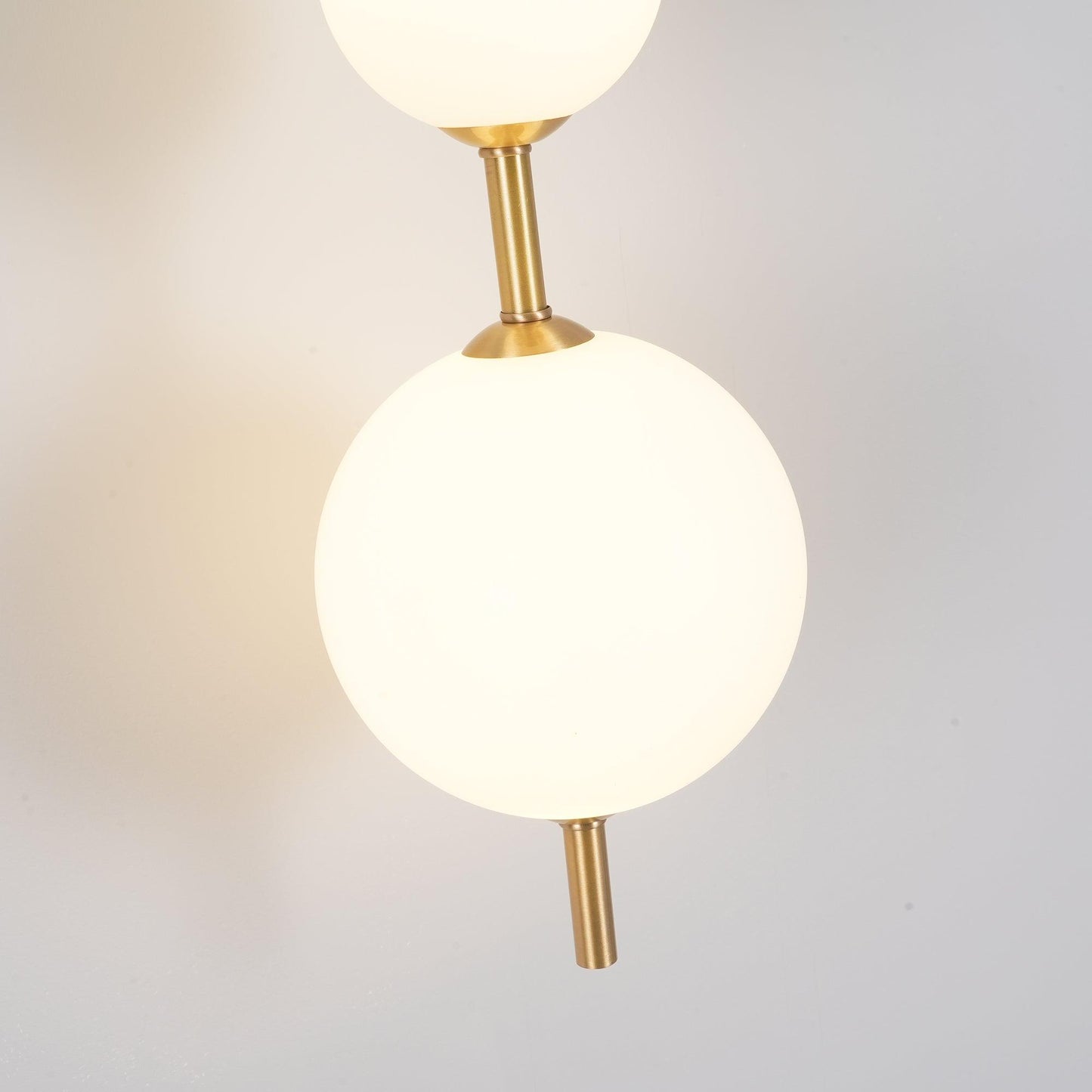 Cerin Vertical Globe Wall Lamp