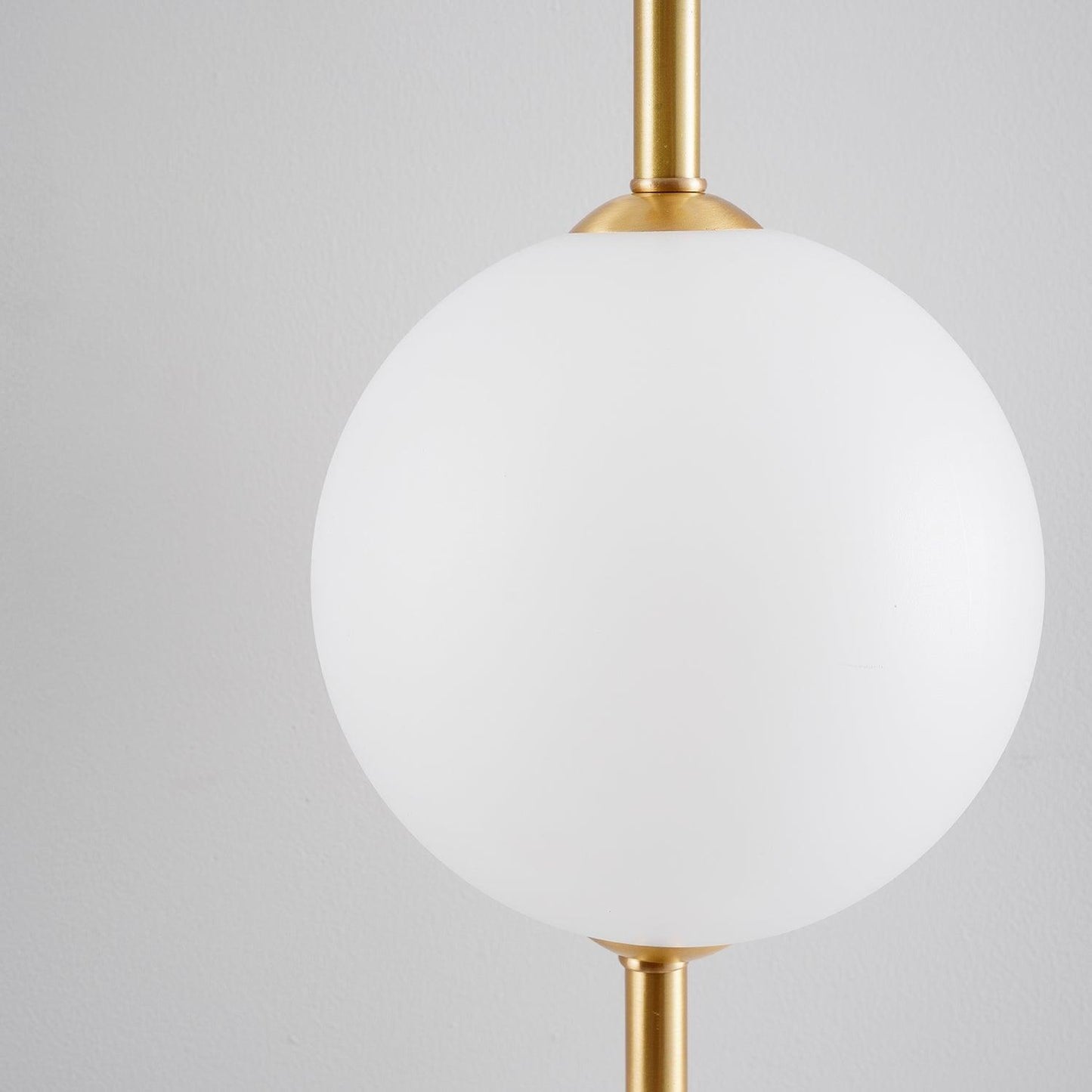 Cerin Vertical Globe Wall Lamp